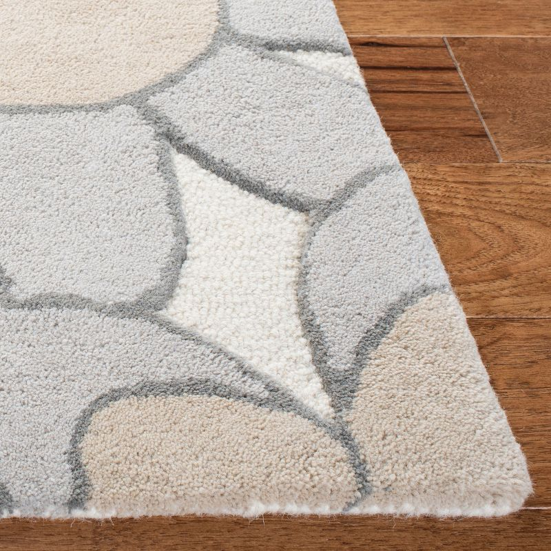 Safavieh Kids SFK923 Hand Tufted Area Rug - Ivory/Pink - 3'x5' - Safavieh.