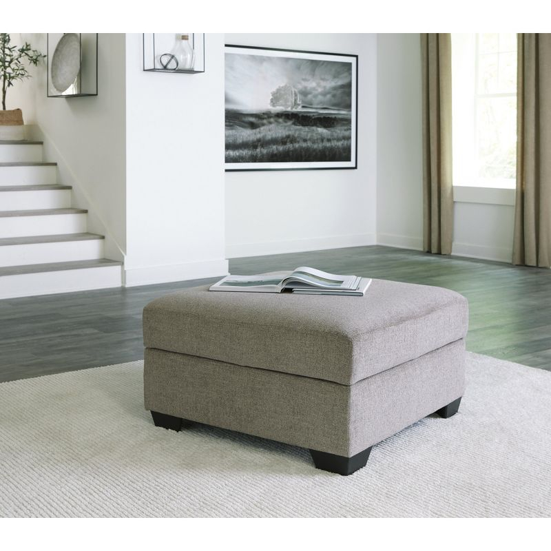 Signature Design by Ashley Creswell Upholstered Ottoman With Storage, Stone Gray