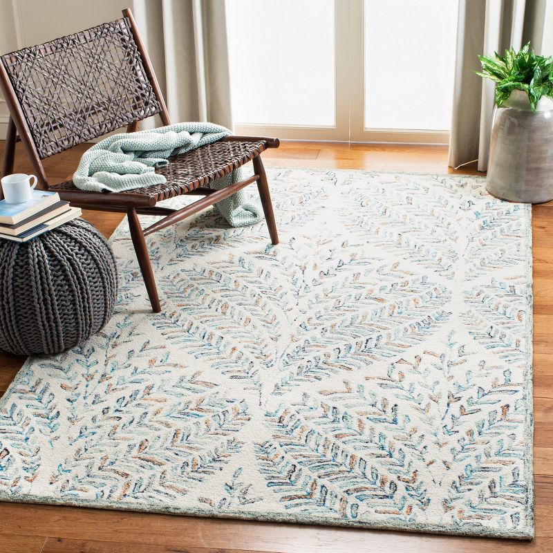 Capri CPR208 Tufted Indoor Area Rug - Ivory/Blue - 9'x12' - Safavieh