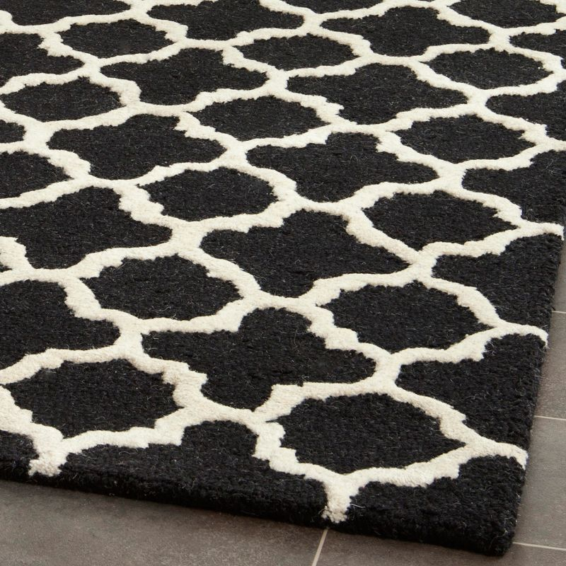 Cambridge CAM130 Hand Tufted Area Rug - Black/Ivory - 8'x10' - Safavieh.