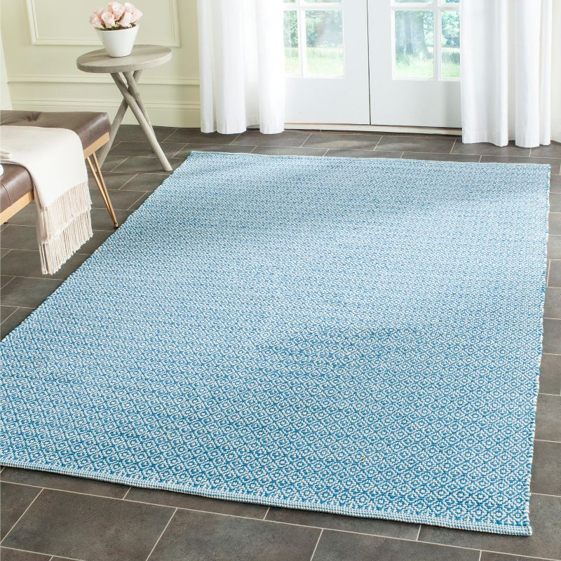 Montauk MTK717 Hand Woven Area Rug - Ivory/Blue - 5'x7' - Safavieh.