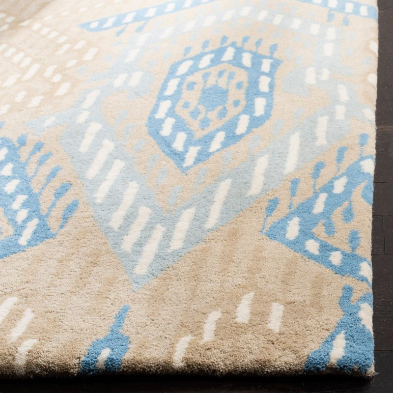 Wyndham WYD373 Hand Tufted Area Rug - Beige/Blue - 5'x8' - Safavieh.