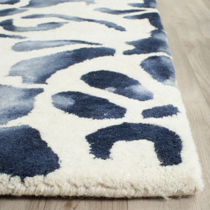 Dip Dye DDY719 Hand Tufted Area Rug - Ivory/Navy - 8'x10' - Safavieh.
