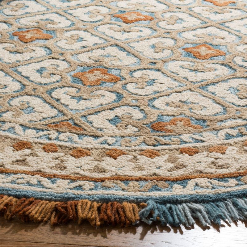 Blossom BLM420 Hand Tufted Area Rug - Ivory/Blue - 6' Round - Safavieh.