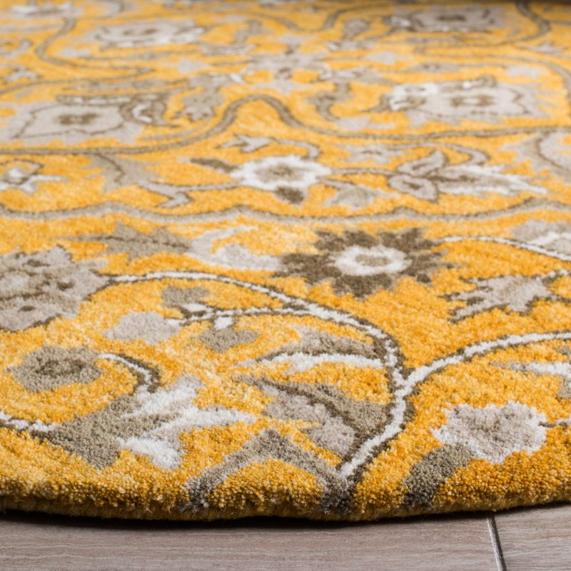Bella BEL673 Hand Tufted Area Rug - Gold/Taupe - 5' round - Safavieh.