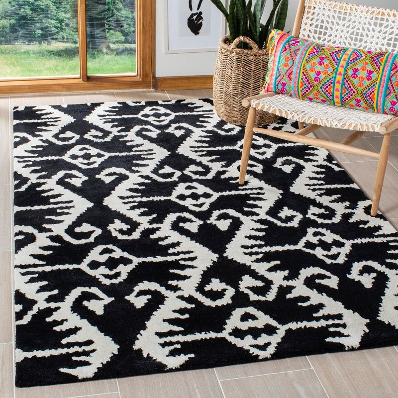Wyndham WYD323 Hand Tufted Indoor Area Rug - Black/Ivory - 6'x9' - Safavieh.