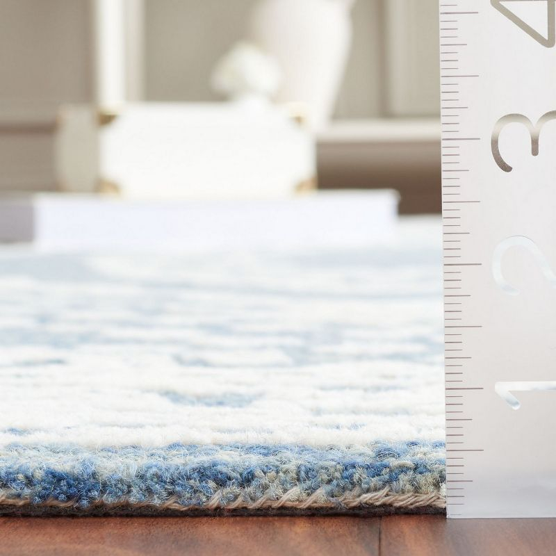 Ebony EBN306 Hand Tufted Indoor Area Rug - Ivory/Navy - 6'x9' - Safavieh