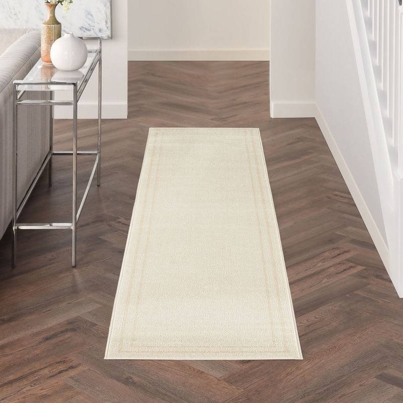 Nourison Essentials 2' x 6' Ivory Gold Contemporary Bordered Indoor/Outdoor Area Rug