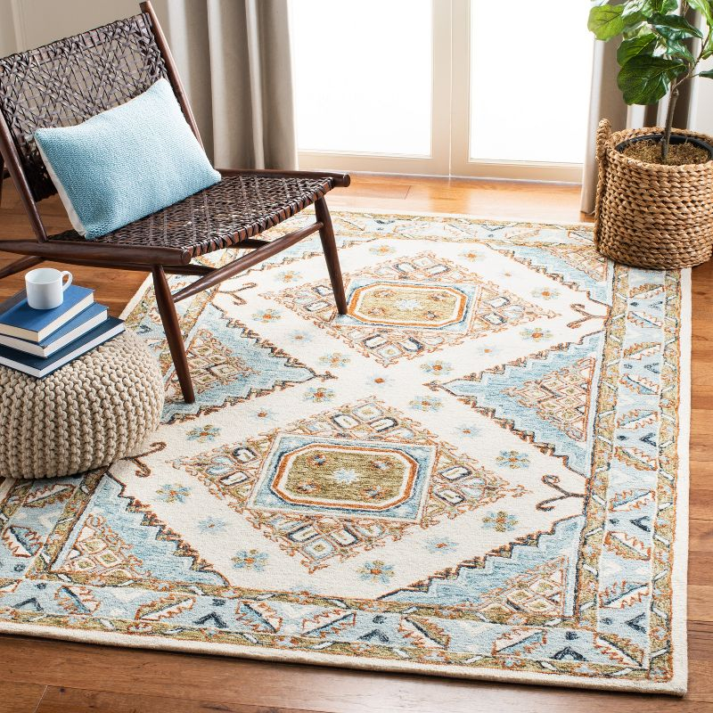Capri CPR209 Hand Tufted Area Rug - Ivory/Rust - 4'x6' - Safavieh.