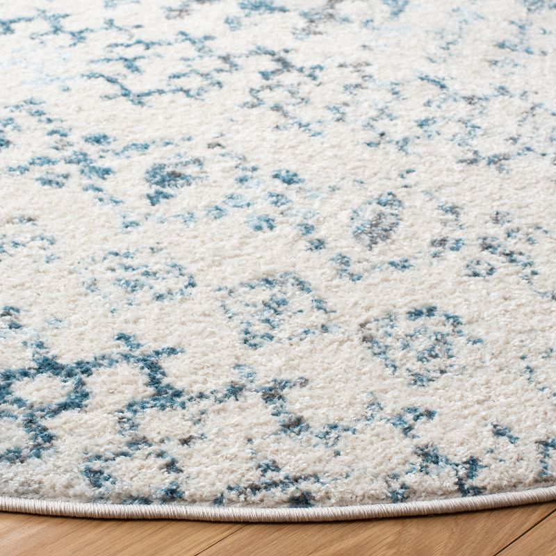 Tulum TUL240 Power Loomed Area Rug - Ivory/Turquoise - 6'7" round - Safavieh.