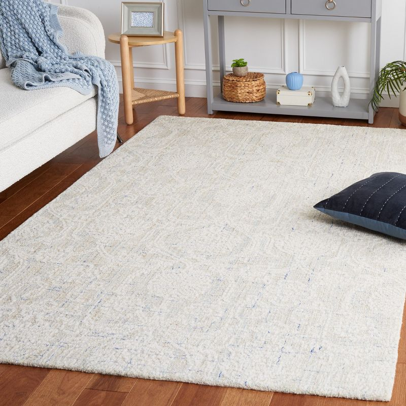 Ebony EBN111 Hand Tufted Area Rug - Blue/Ivory - 5'x8' - Safavieh.