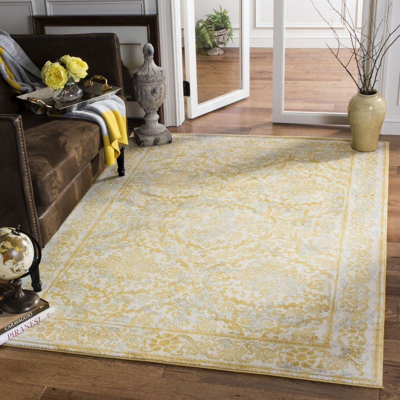 Evoke EVK242 Power Loomed Area Rug - Ivory/Gold - 6'7"x9' - Safavieh.