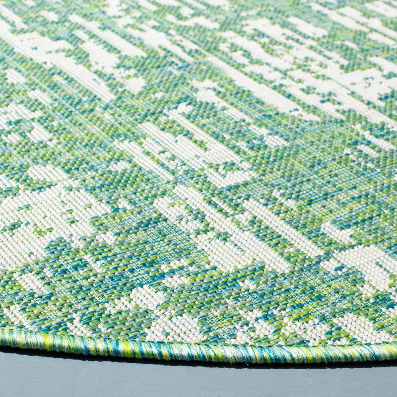 Courtyard CY8452 Power Loomed Indoor and Outdoor Area Rug - Green Blue/Ivory - 6'7" Round - Safavieh