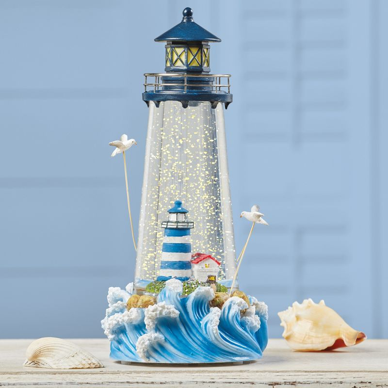 Collections Etc LED Lighted Hand-Painted Lighthouse Water Glitter Globe Blue