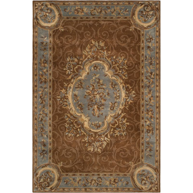 Empire EM409 Hand Tufted Wool Area Rug - Blue/Brown- 6' X 9' - Safavieh.