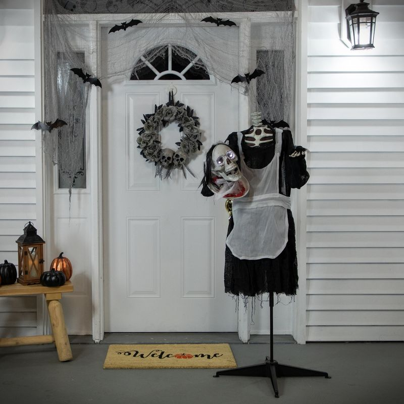 Northlight LED Animated Head-in-Hand Skeleton Maid Halloween Decoration - 57" - White Lights