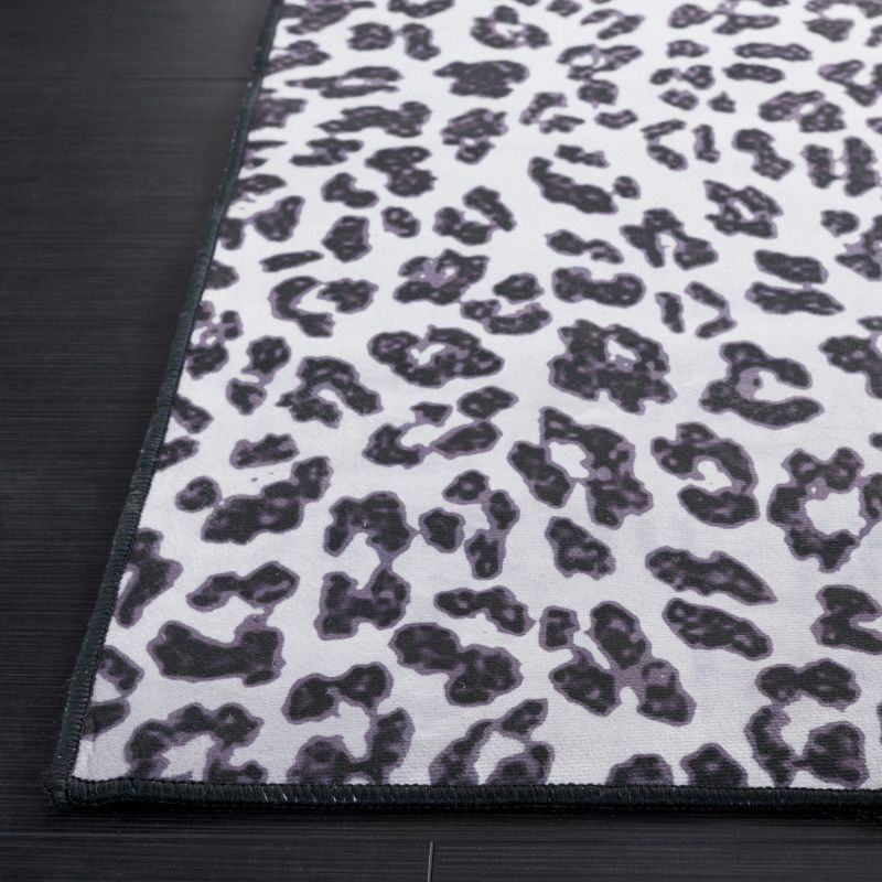 Faux Hide FAH505 Power Loomed Machine Washable Indoor Accent Rug - Ivory/Black - 3'x5' - Safavieh