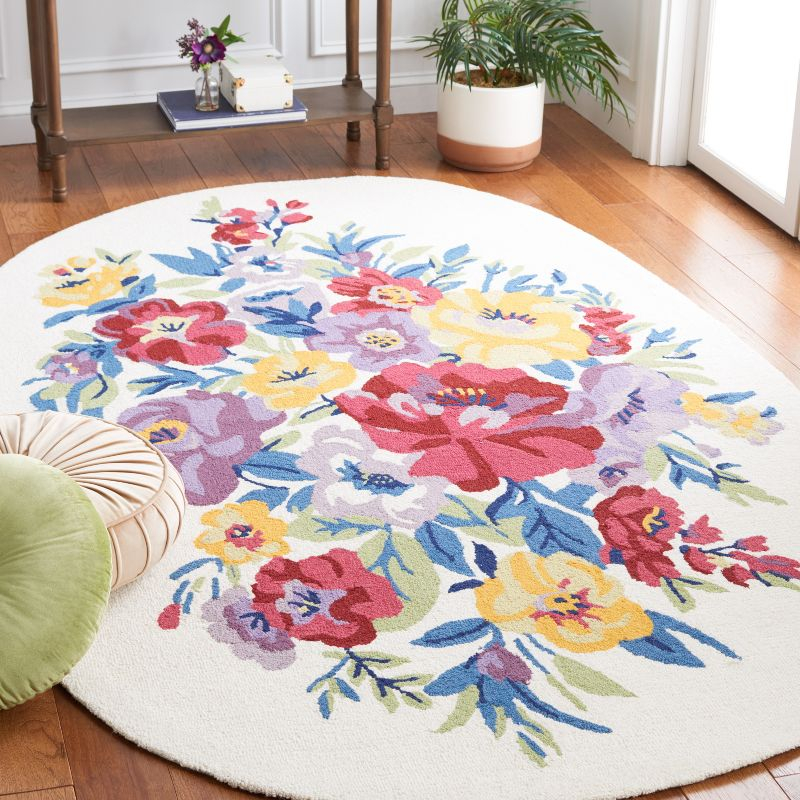 Chelsea HK219 Hand Tufted Area Rug - Ivory/Rose - 3'x5' Oval - Safavieh.