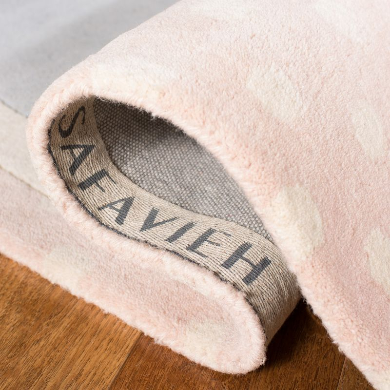 Safavieh Kids SFK922 Hand Tufted Area Rug - Pink/Ivory - 8'x10' - Safavieh.