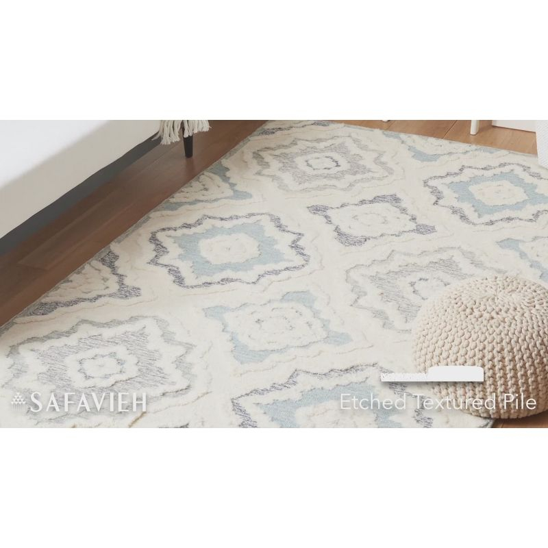 Metro MET111 Hand Tufted Indoor Area Rug - Ivory/Light Blue - 8'x10' - Safavieh