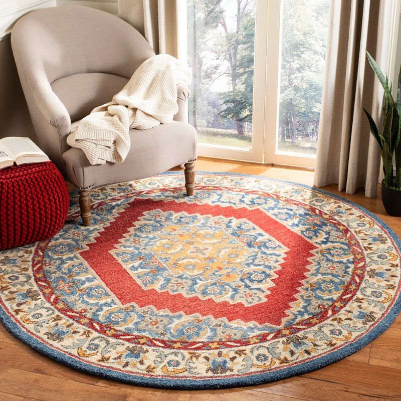 Antiquity AT505 Hand Tufted Area Rug - Blue/Red - 6' Round - Safavieh.