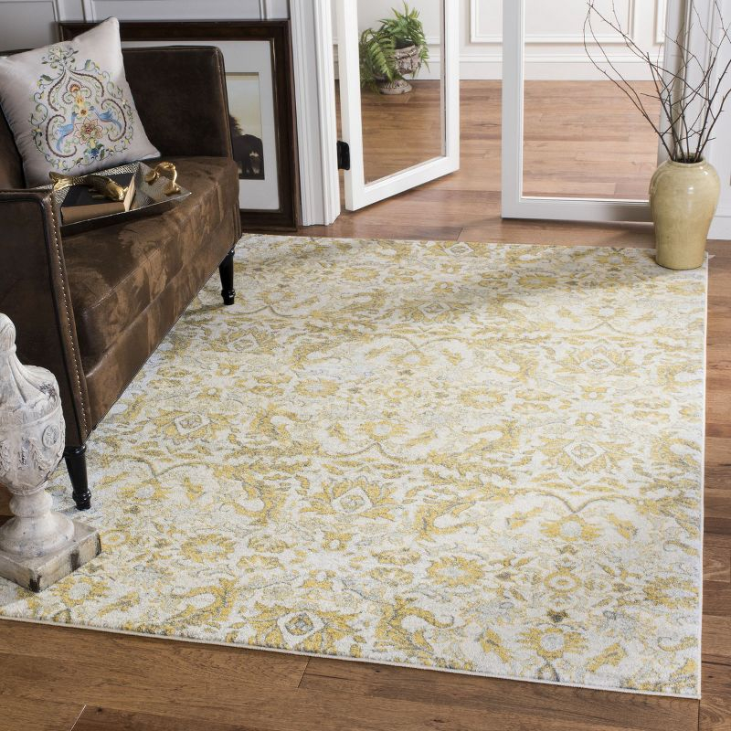 Evoke EVK238 Power Loomed Area Rug - Ivory/Gold - 6'7"x9' - Safavieh.