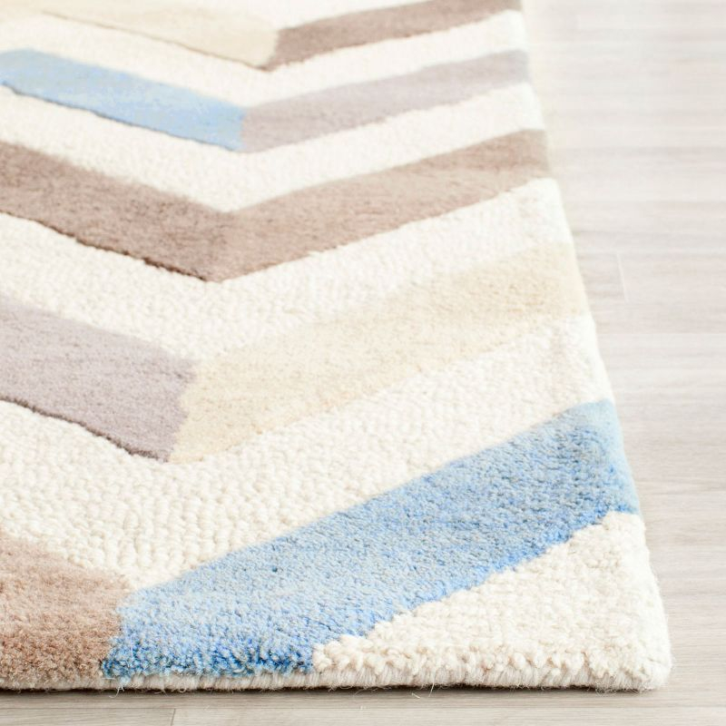 Cambridge CAM580 Hand Tufted Accent Rug Ivory / Grey 2' X 3' - Safavieh.