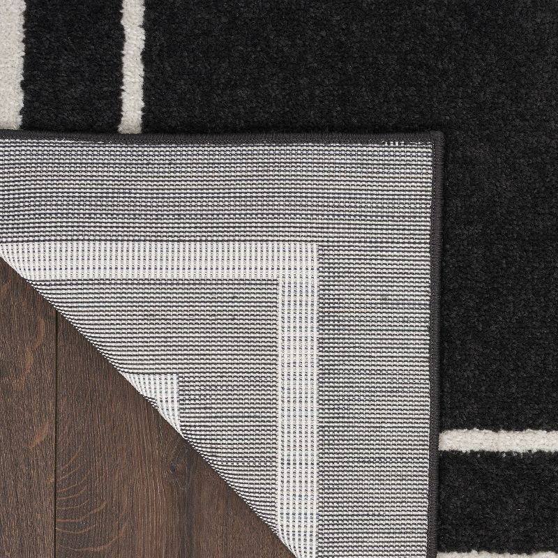 Nourison Essentials 4' x 6' Black Ivory Contemporary Bordered Indoor/Outdoor Area Rug