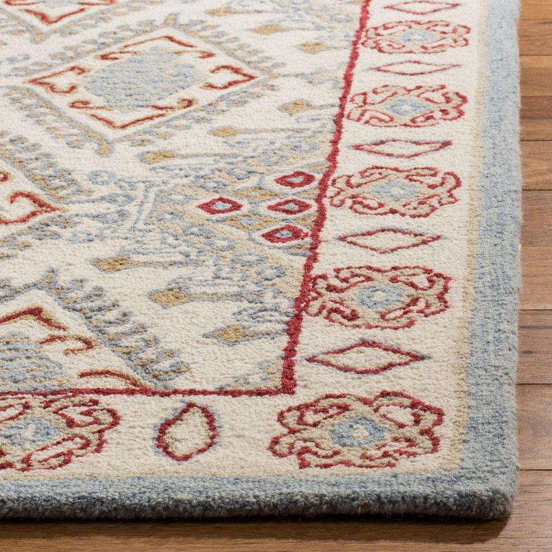 Micro-Loop MLP511 Hand Tufted Indoor Area Rug - Ivory/Red - 5'x8' - Safavieh