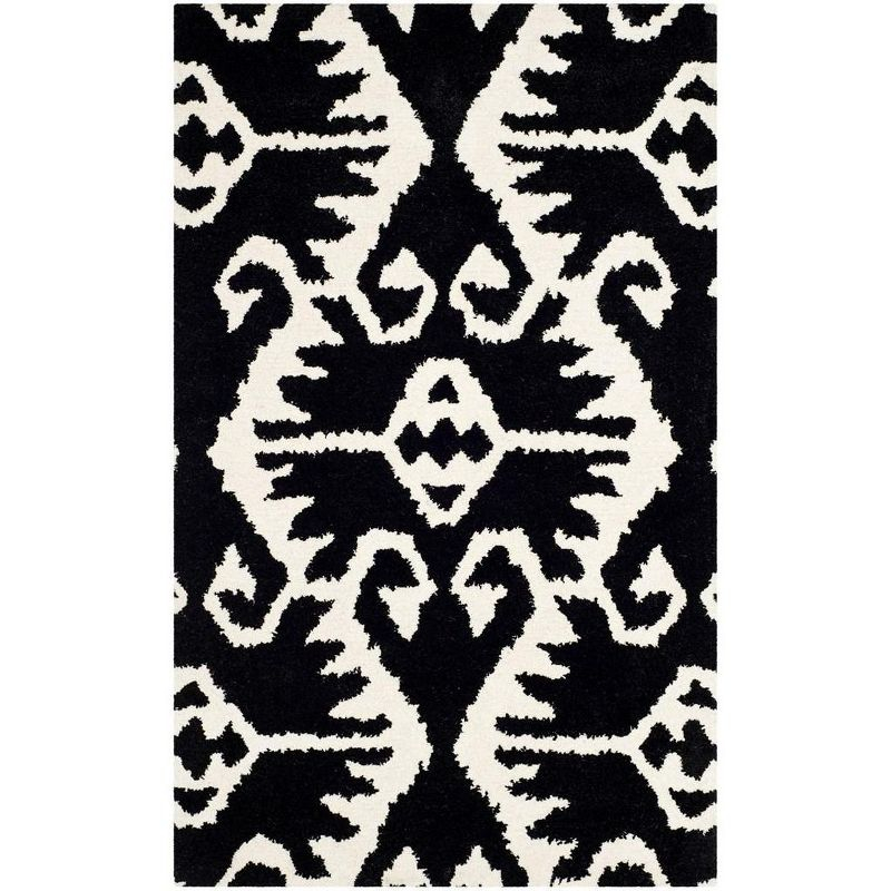 Wyndham WYD323 Hand Tufted Indoor Accent Rug - Black/Ivory - 2'6"x4' - Safavieh.