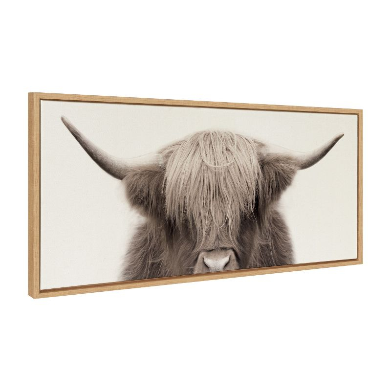 Kate and Laurel Sylvie Hey Dude Highland Cow Color Framed Canvas by The Creative Bunch Studio, 18x40, Natural