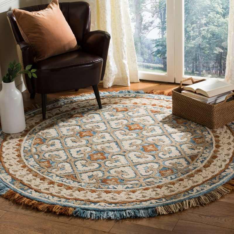 Blossom BLM420 Hand Tufted Area Rug - Ivory/Blue - 6' Round - Safavieh.