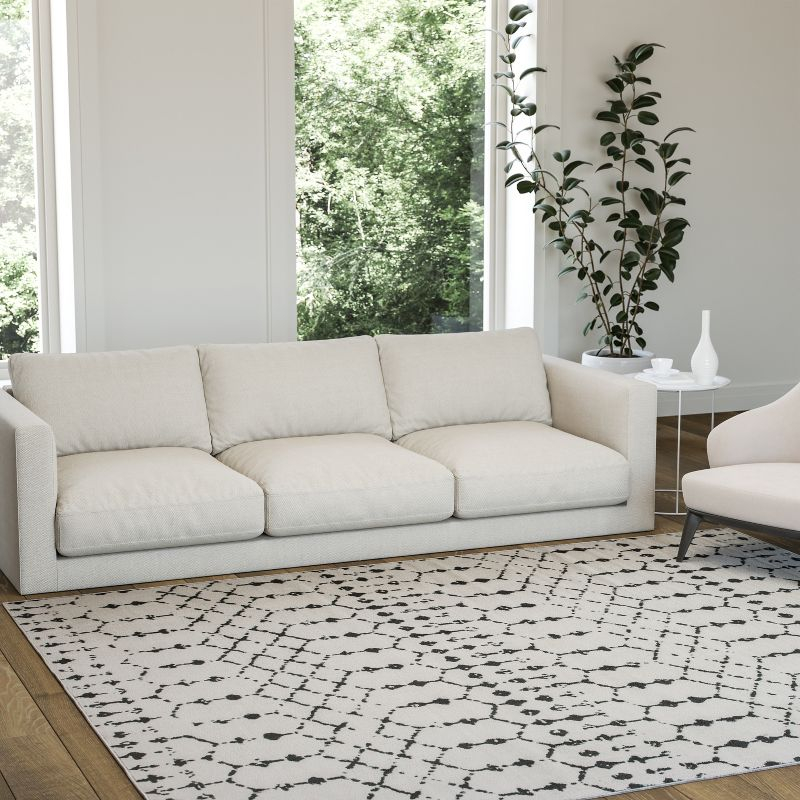 Emma and Oliver Modern Design Geometric Bohemian Low Pile 8' x 10' Ivory And Black Area Rug