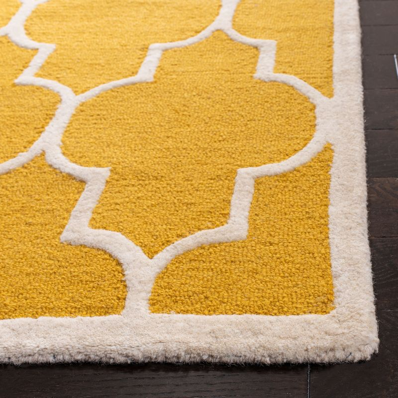 Cambridge CAM134 Tufted Indoor Area Rug - Gold/Ivory - 6'x9' - Safavieh