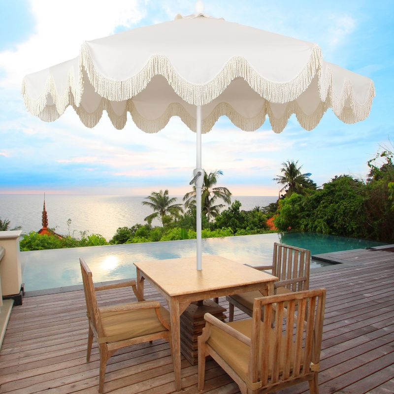 JONATHAN Y Collins 9 ft. Classic Cottage Tassel Market Patio Umbrella with Auto-Tilt, Crank, Wind Vent and UV Protection in Cream