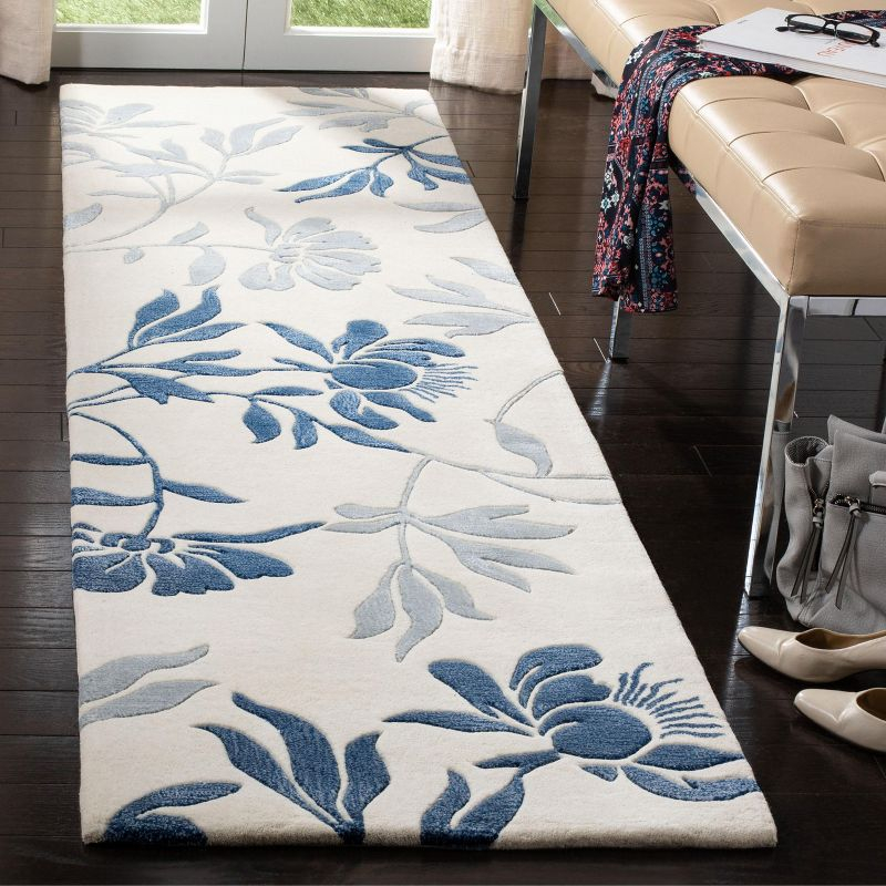 Capri CPR345 Hand Tufted Runner Rug - Ivory/Blue - 2'3"x9' - Safavieh.