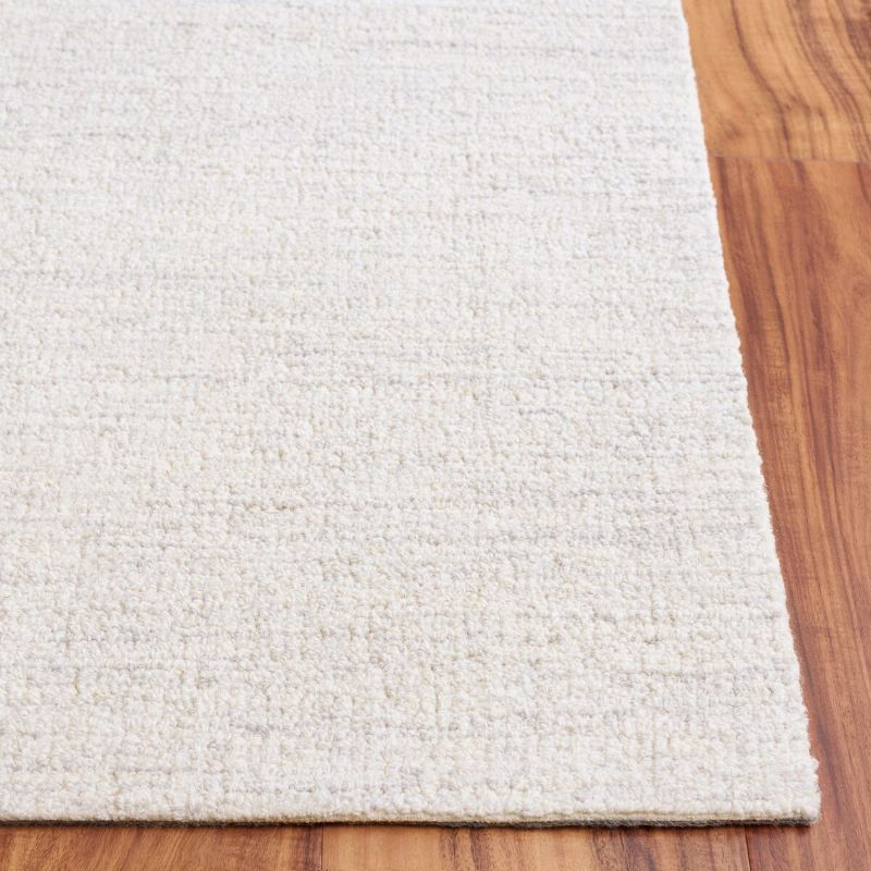 Ebony EBN353 Hand Tufted Area Rug - Light Grey/Ivory - 5'x8' - Safavieh.