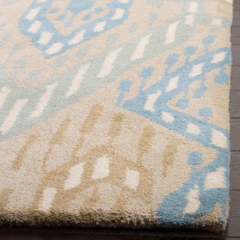 Wyndham WYD373 Hand Tufted Area Rug - Blue/Ivory - 8'x10' - Safavieh.