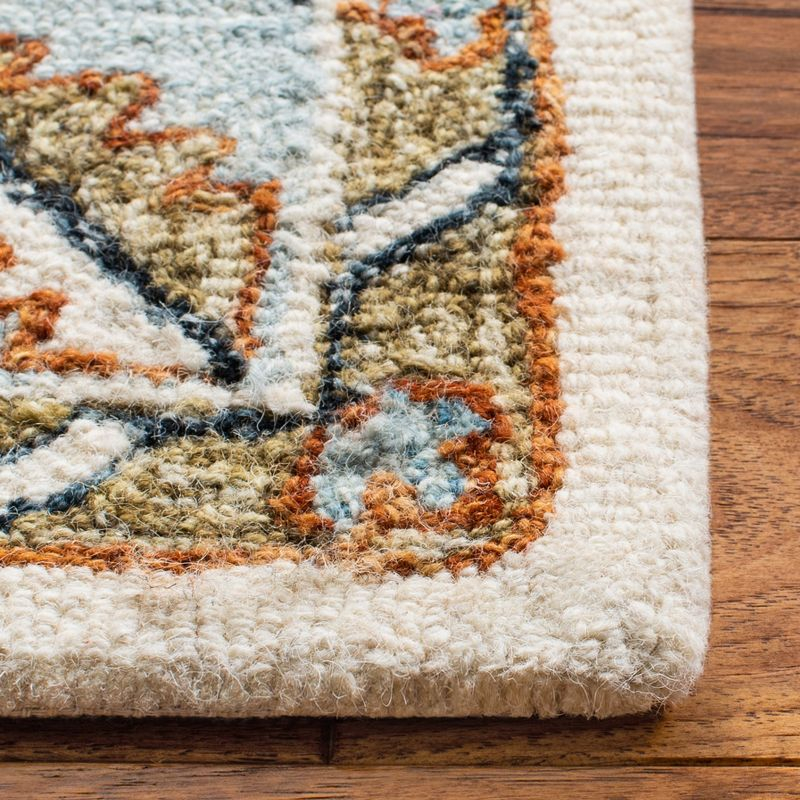Capri CPR209 Hand Tufted Area Rug - Ivory/Rust - 7'x7' - Safavieh.
