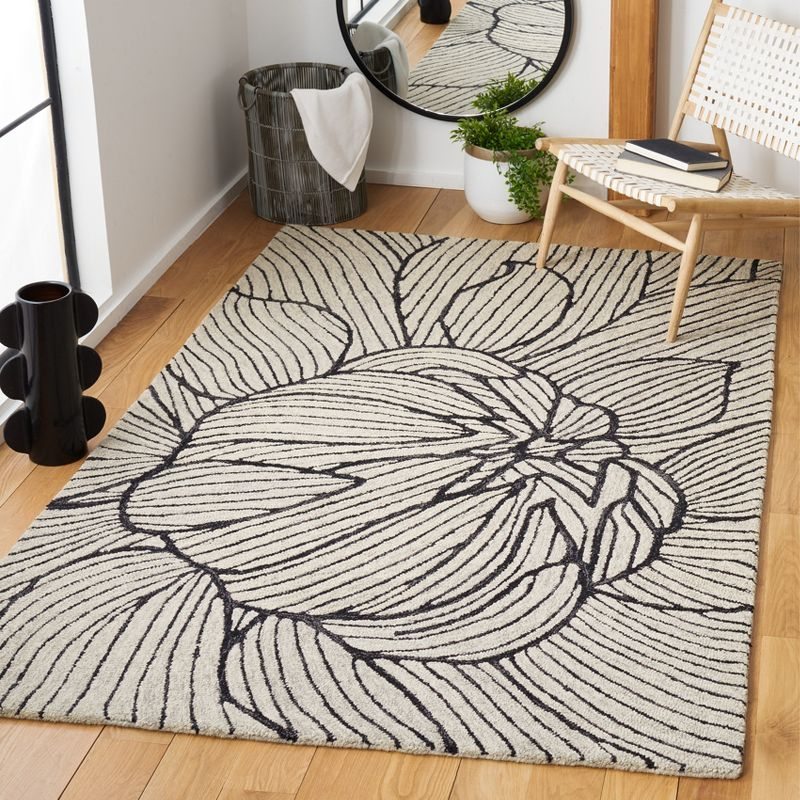 Metro MET451 Hand Tufted Indoor Area Rug - Black/Ivory - 4'x6' - Safavieh
