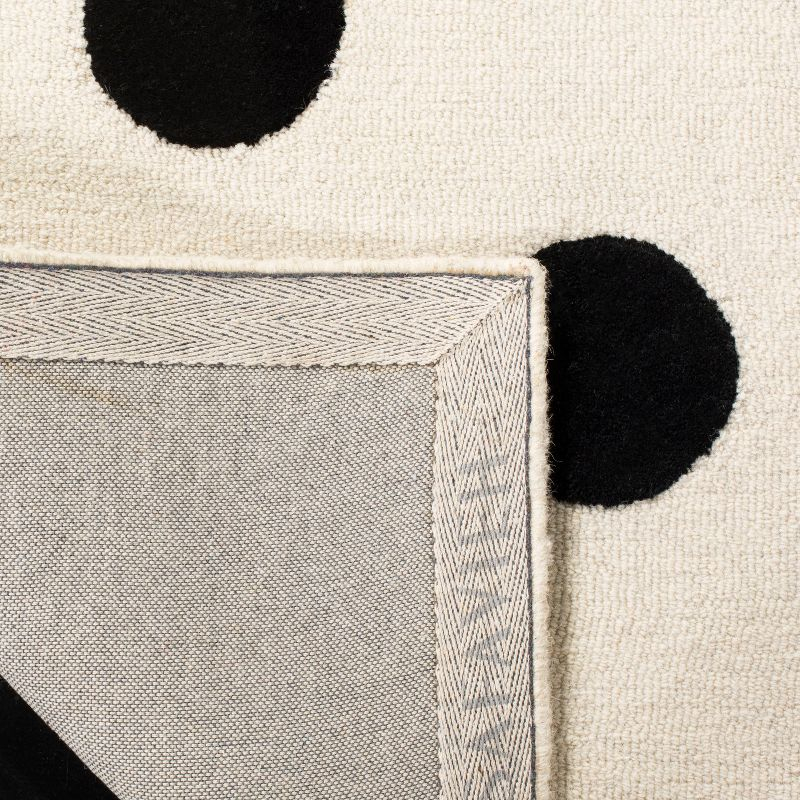 Safavieh Kids Polka Dots SFK904 Hand Tufted Indoor Area Rug - Ivory/Black - 5'x5' - Safavieh