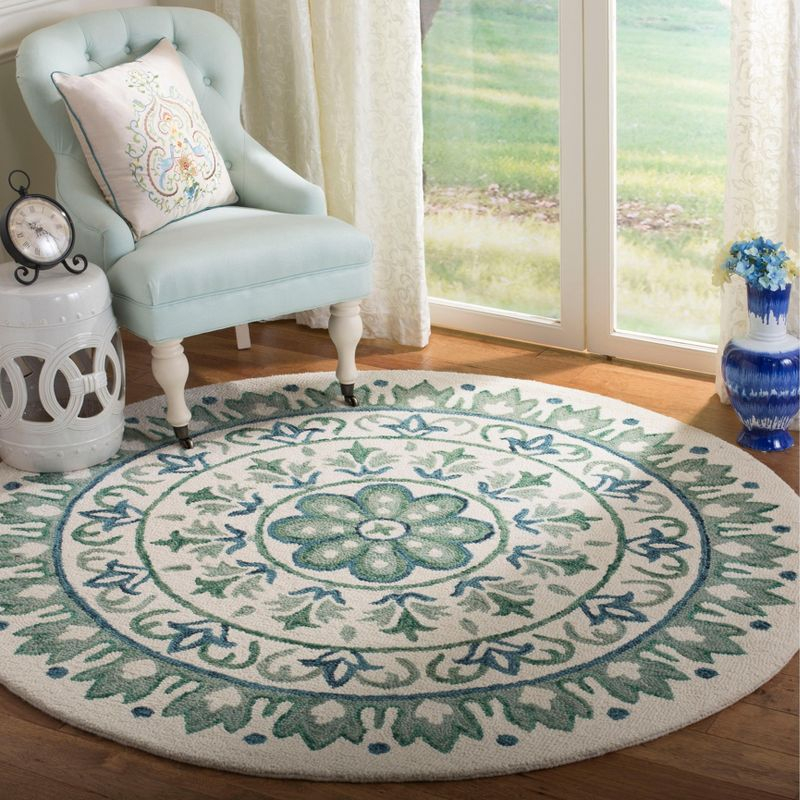 Novelty NOV607 Hand Tufted Area Rug - Ivory/Teal - 6' Round - Safavieh.