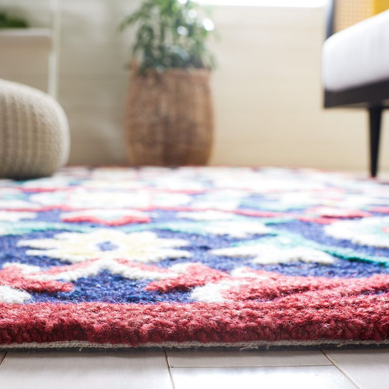 Blossom BLM564 Hand Tufted Area Rug - Navy/Red - 8'x10' - Safavieh.