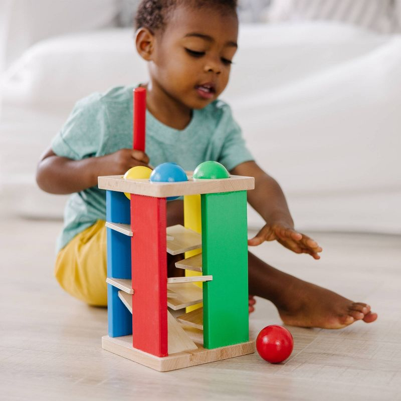 Melissa & Doug Deluxe Pound and Roll Wooden Tower Toy With Hammer