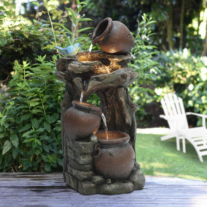 LuxenHome Rustic Pots and Pitchers on Tree Resin Outdoor Fountain with Lights Brown