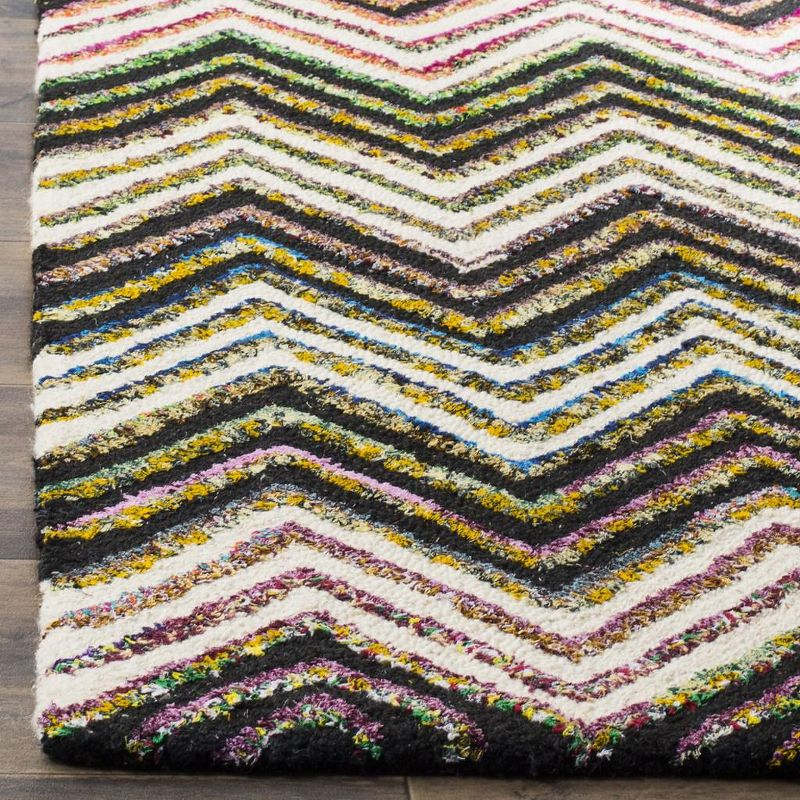 Nantucket NAN601 Hand Tufted Area Rug - Ivory/Black - 6'x9' - Safavieh.