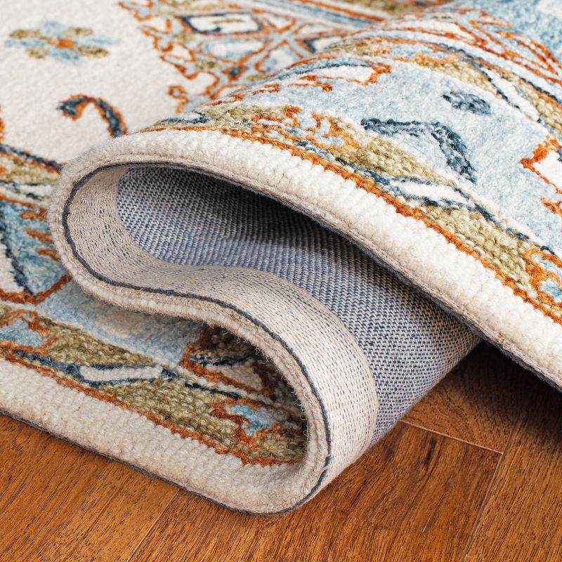 Capri CPR209 Hand Tufted Area Rug - Ivory/Rust - 7'x7' - Safavieh.