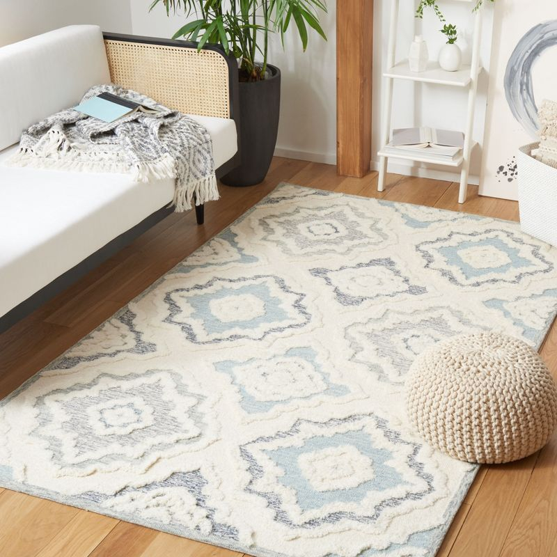 Metro MET111 Hand Tufted Indoor Area Rug - Ivory/Light Blue - 8'x10' - Safavieh
