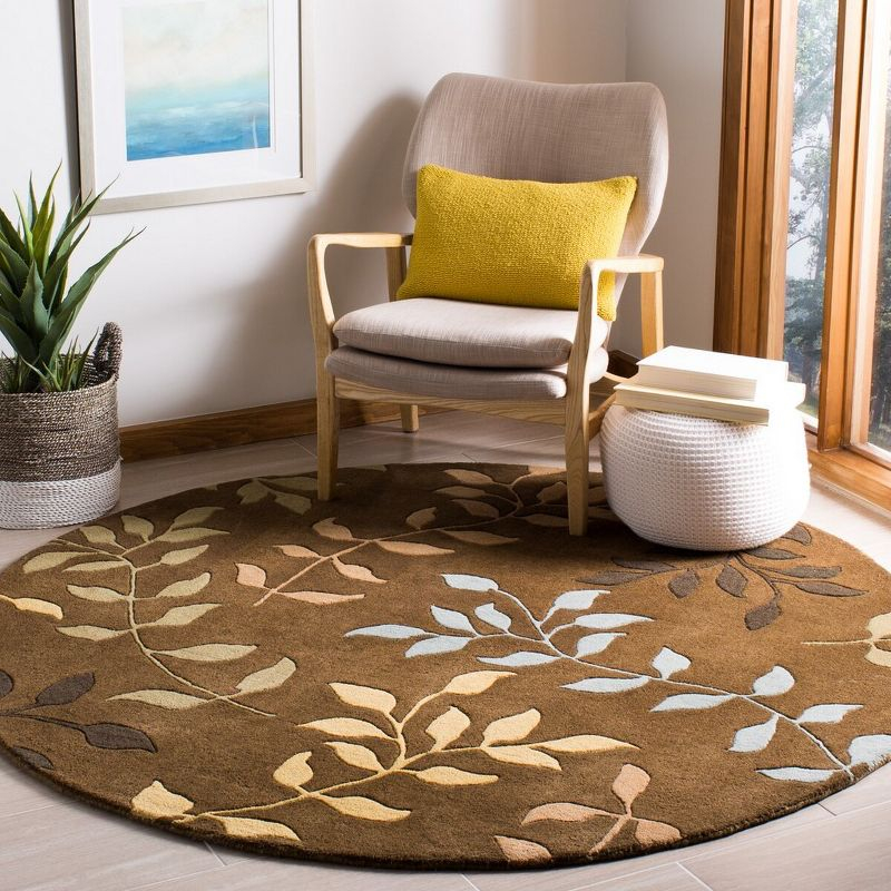 Soho SOH833 Hand Tufted Indoor Area Rug - Brown/Multi - 6' round - Safavieh.