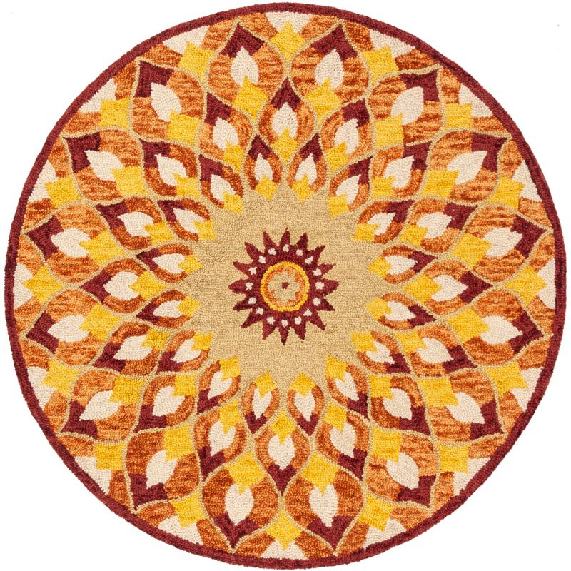 Novelty NOV603 Hand Tufted Area Rug - Rust/Gold - 5' round - Safavieh.